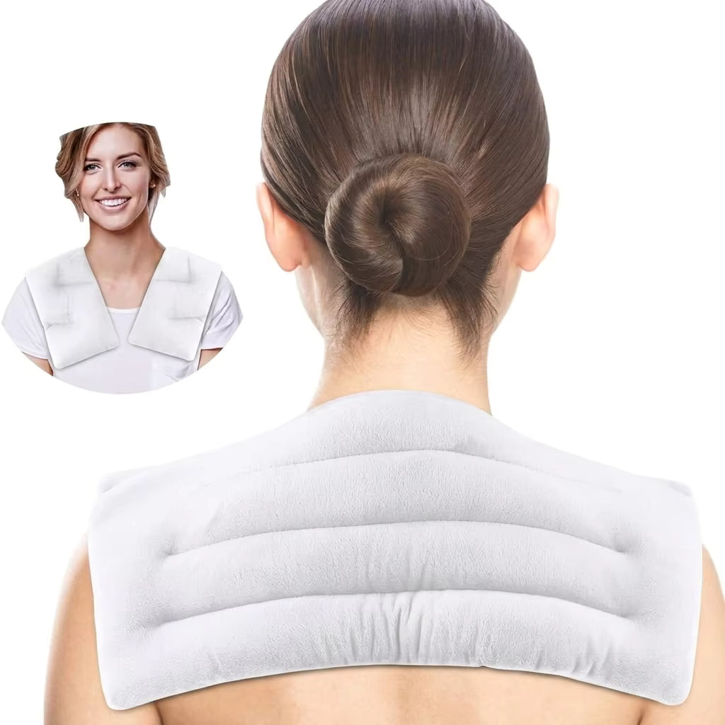 Person wearing weighted neck wrap while working at desk for focus and stress reduction